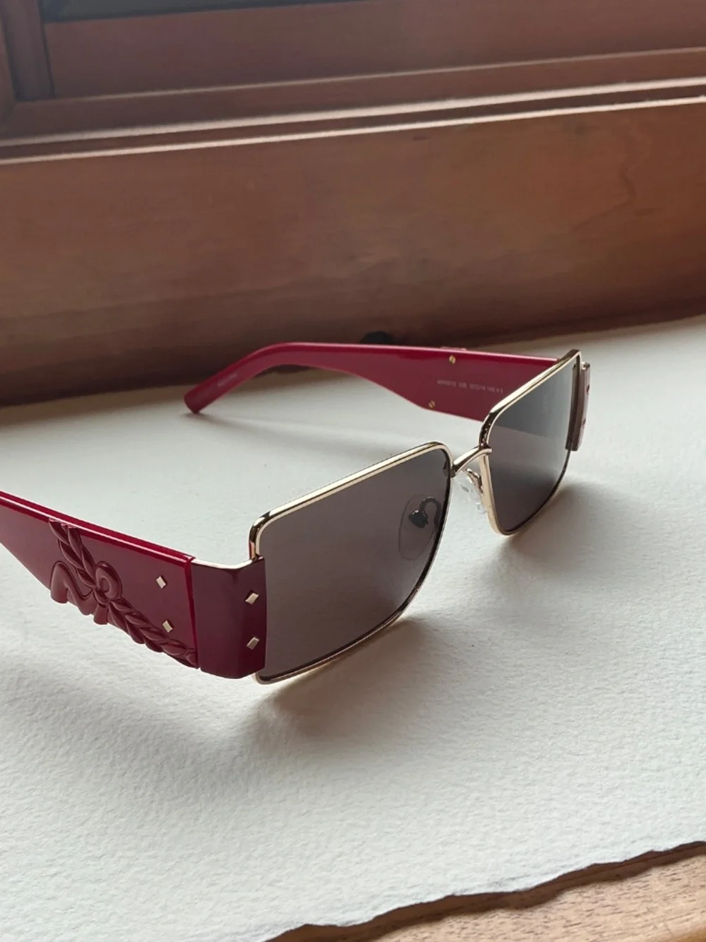 MCM Red and Gold Shield Sunglasses with crossbody case